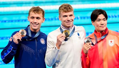 Swimming-Majestic Marchand puts France in a frenzy with first pool gold