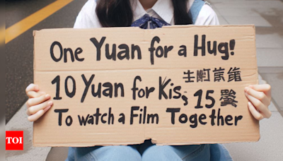 'One yuan for hug, 10 yuan for kiss ...': Increasing 'street girlfriends' trend in China offers no-sex companionship - Times of India