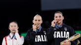 Chinese gymnast’s ‘relatable’ reaction to competitors biting medals on Olympic podium goes viral