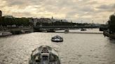 Dozens of boats cruise the Seine river in a rehearsal for the Paris Olympics’ opening ceremony