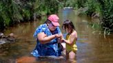 'I can't handle the heat': Temps hover around 100 Thursday