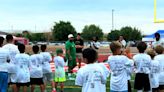 NFL, Lobo players come out for SHMAC Athletics camp