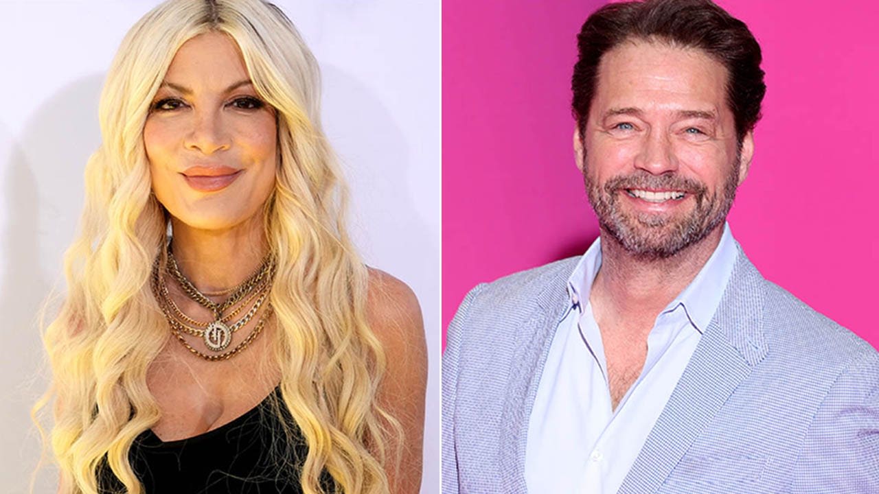 Tori Spelling says she chipped her front tooth during makeout session with Jason Priestley in an elevator