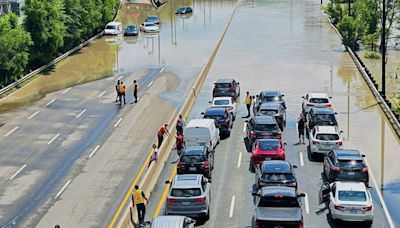 Torrential rains flood Toronto, causing power outages, traffic disruption