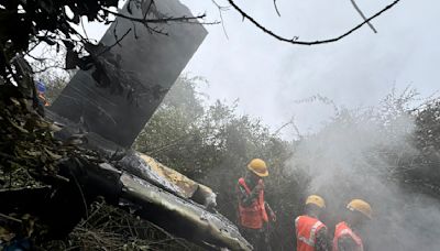 5 people killed in a helicopter crash in the mountains northwest of Nepal's capital