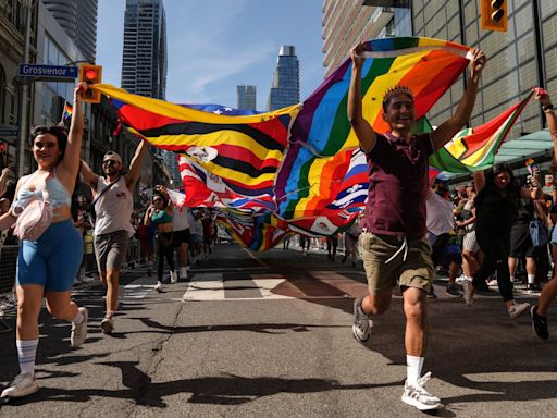 Downtown Toronto streets fill with revelers, rainbow flags for city's Pride parade