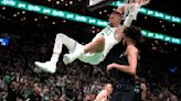 Brown has 22, Porzingis returns with 20 as Celtics open NBA Finals with 107-89 win over Mavericks