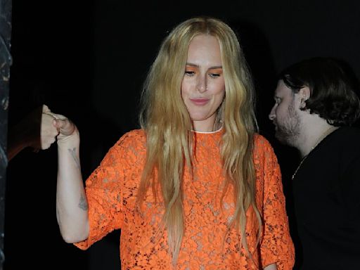 Rumer Willis puts on leggy display in orange lace mini dress