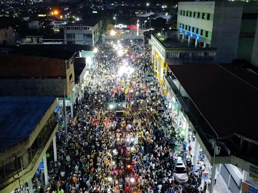 Venezuela opposition hold defiant rally one month before election