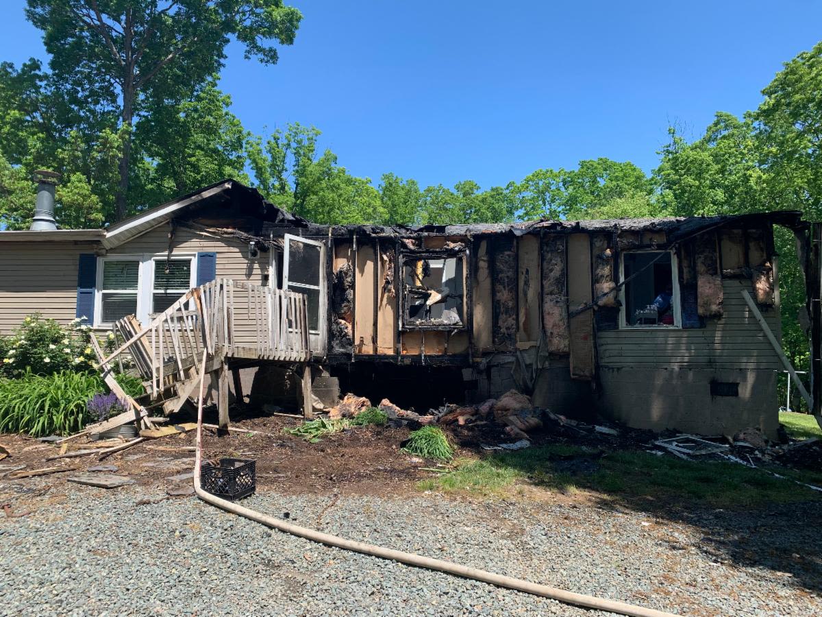 Authorities: Car crashed into Albemarle home during domestic incident, setting it on fire