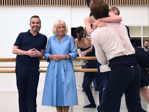 Queen Camilla is a vision in blue as she arrives at English National Ballet