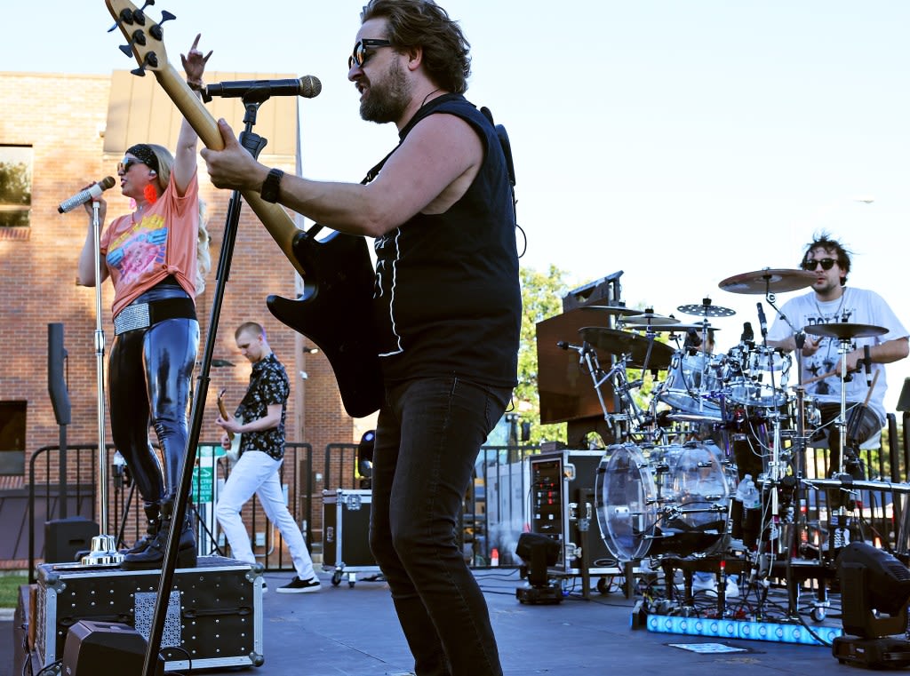 Summer in Elmwood Park starts with vintage cars on display, bands on stage, and movies in the park