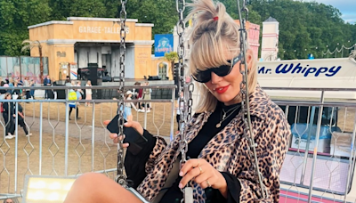 Danni Menzies flashes legs at gig as fans brand her 'absolutely gorgeous'