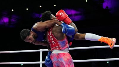 US boxer trailed on Olympic judges' scorecards entering final round. How he advanced