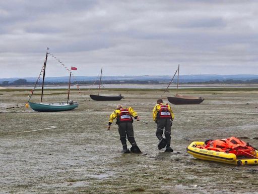 Rescue operation after person gets stuck in mud at beauty spot