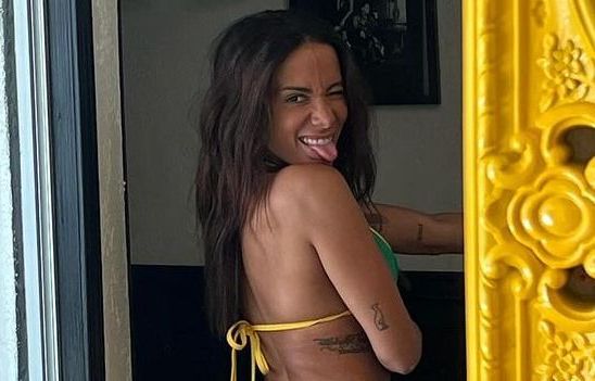 Anitta’s Teeny Tiny String Bikini Coordinates With Her… Yellow Fridge?