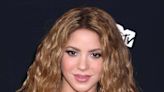 Shakira Simmers In A Fishnet Top & Chunky Boots As She Talks About How Having A Husband ‘Dragged Her Down...