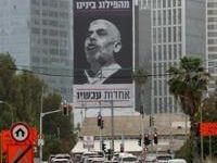 A billboard in Tel Aviv, Israel, shows Yahya Sinwar, Hamas's Gaza chief with the Hebrew message: 'Think well of who benefits from our division -- unity now'