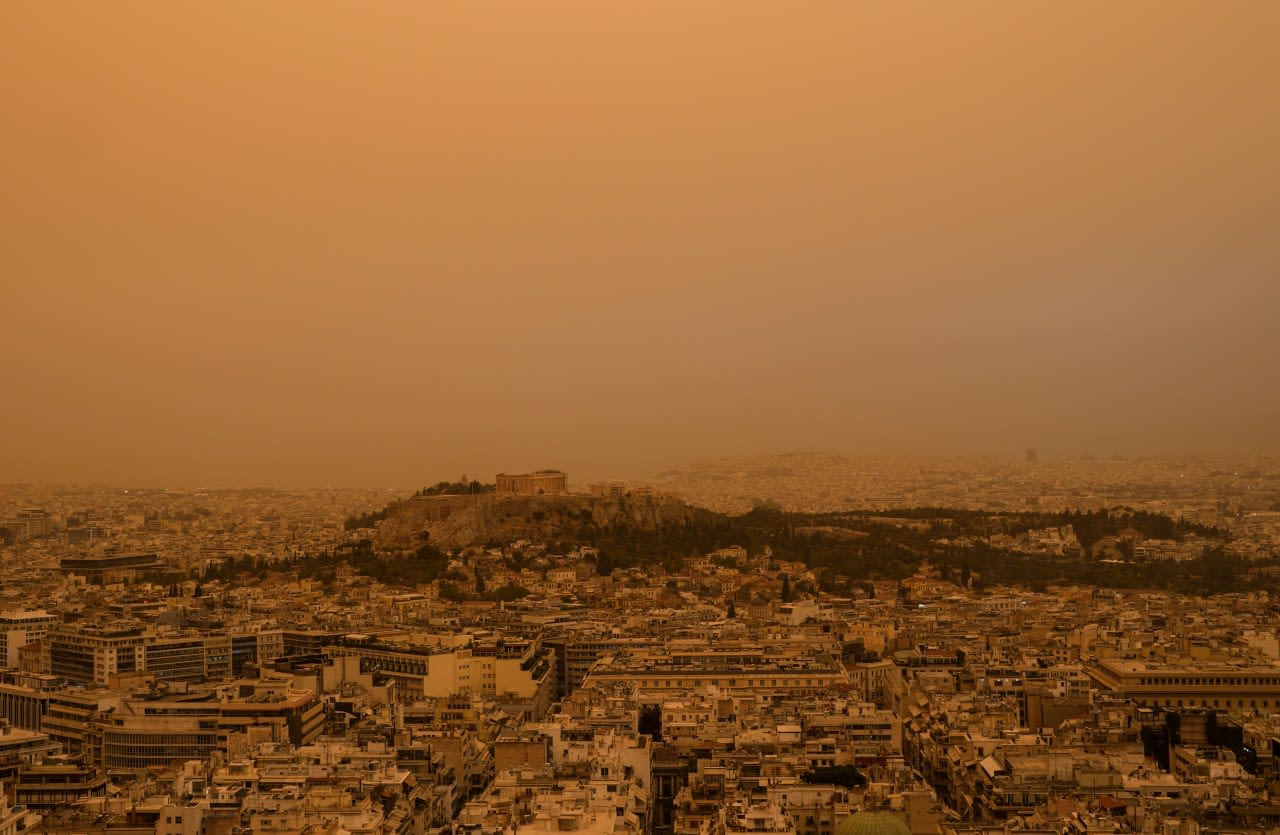 Martian skies over Athens? Greece’s capital turns an orange hue with dust clouds from North Africa