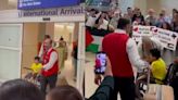 Palestinian amputee child from Gaza greeted by cheering crowd at US airport