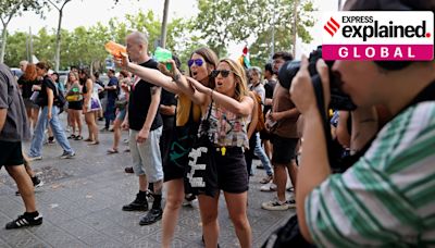 Why are locals in Barcelona firing water pistols at tourists and asking them to ‘go home’?