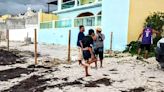 Denuncian a mujer extranjera que intenta adueñarse de playa en Yucatán de manera ilegal