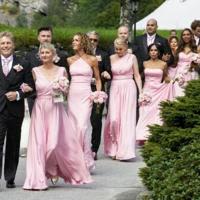 The bridesmaids react upon arrival at Hotel Union on Vinjevollen in Geiranger after the wedding ceremony