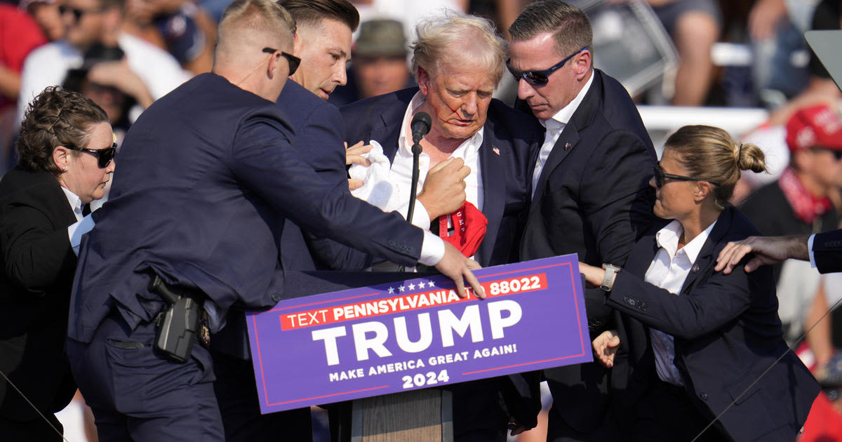 Trump safe after being rushed off rally stage when shots fired; gunman and audience member dead