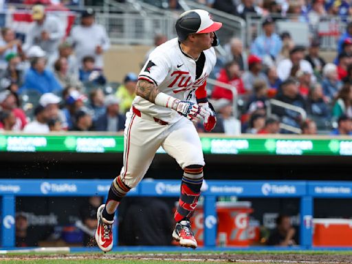 Miranda's 5 hits lead Twins to rain-shortened 12-3 win over Tigers