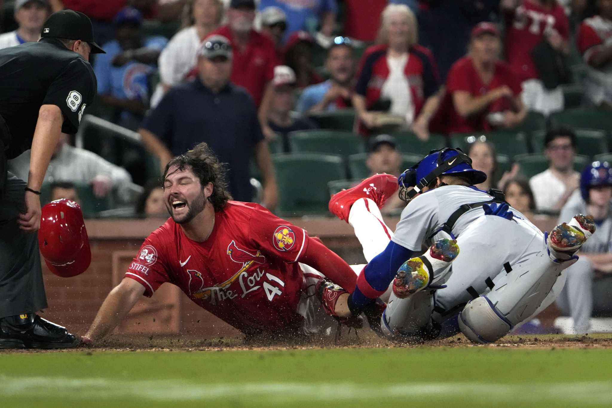 Cardinals rally in the eighth and then hold off Cubs for a 7-6 victory