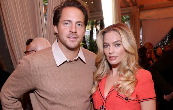 Margot Robbie and husband Tom Ackerley dual it out over if British or Aussie snack is better