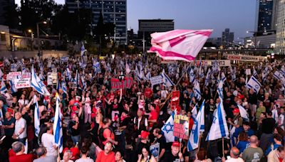 Israel-Gaza war: Tens of thousands rally for hostage deal as Gaza ceasefire talks continue