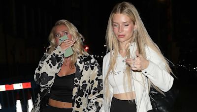 Lottie Moss shows off her abs in a 'father figure' slogan crop top