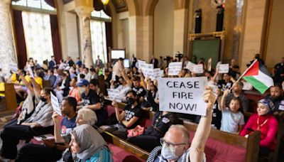 A plan to fund $1 million in security for Jewish spaces is amended after a protest at City Hall