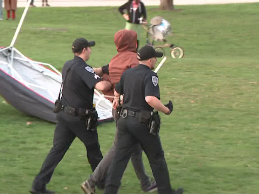 Police taking protestors into custody at University of New Hampshire