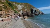 The tiny secret Irish beach with crystal clear water, incredible views & seals