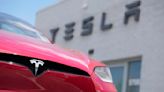 Tesla's stock leaps on reports of Chinese approval for the company's driving software