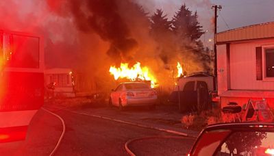 Spokane Valley trailer fire seriously injures one, displaces another