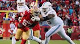 49ers linebacker Dre Greenlaw asks Tom Brady to autograph the ball he intercepted