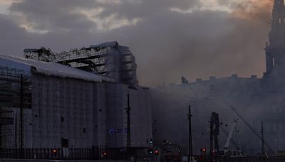 Copenhagen stock exchange fire: Spire collapses as historic Borsen engulfed in flames