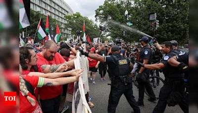 Watch: Thousands of Pro-Palestinian protesters condemn Netanyahu’s Washington visit amid Gaza conflict; Police use pepper spray near US Capitol - Times of India