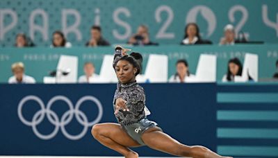 Simone Biles Leads U.S. in Olympic Team Qualifying Despite Injury