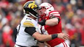 Iowa’s Deacon Hill pitches football while falling to avoid safety