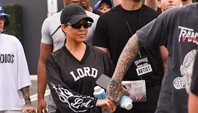 Kourtney wears 'Lord' shirt on run as fans joke it's a 'shoutout' to ex Scott