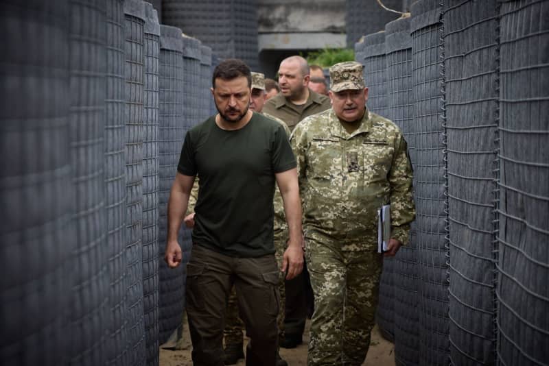 Zelensky visits troops at Belarus border as Russia reports gains