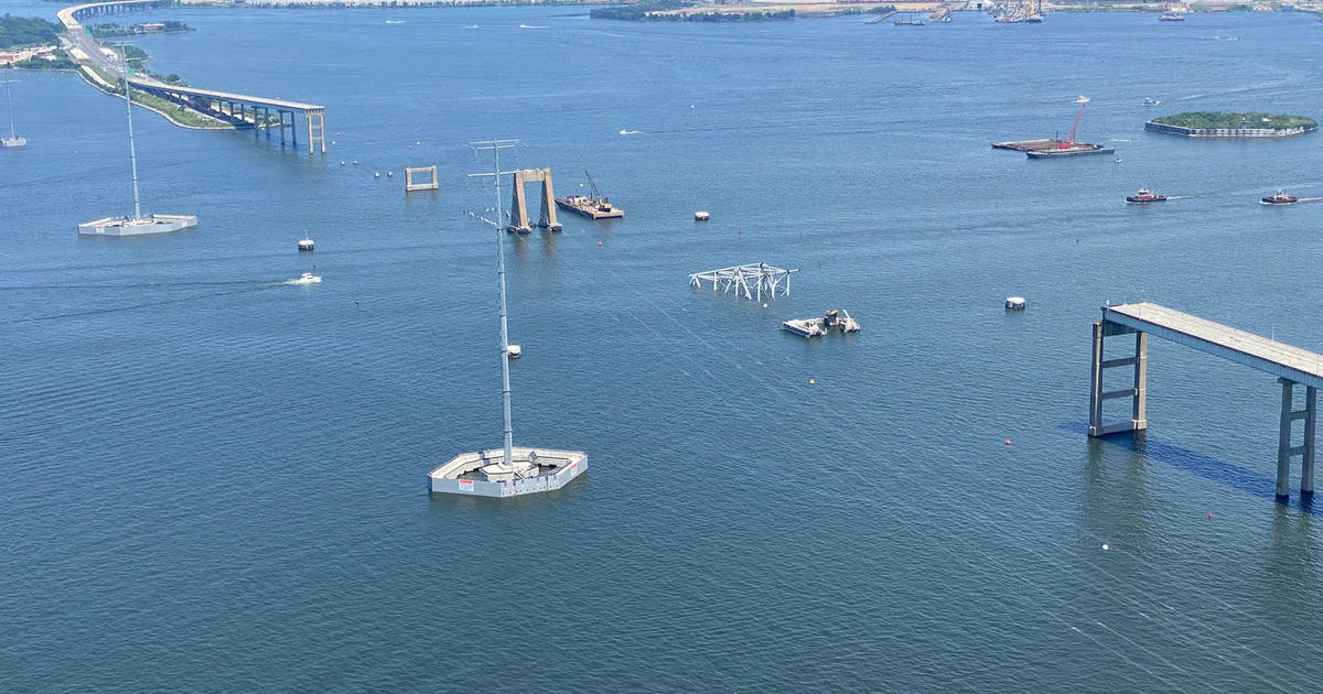 Photos show progress at the Key Bridge collapse site as crews work to remove steel wreckage