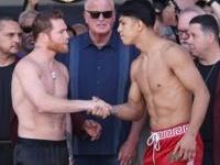 Saul Alvarez and challenger Jaime Munguia shake hands at the weigh-in for their all-Mexican super middleweight world title bout in Las Vegas