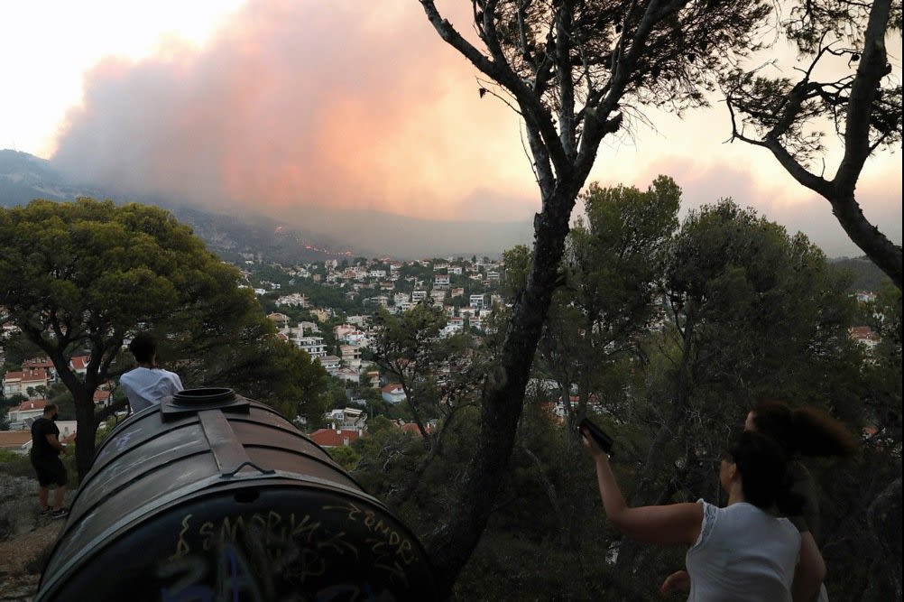 Greece orders evacuations for thousands as wildfires turn deadly, burn 24,000 acres