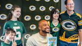 At AJ Dillon's 'Quadzilla' book signing, the littlest Packers fans light up and their parents love his sense of community