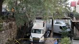 Tractor trailer gets lodged into Factors Walk bridge, damaging bridge and pillar